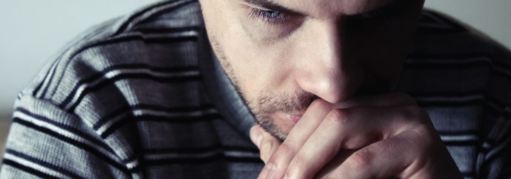 closeup of a man in deep thought - mens group counseling
